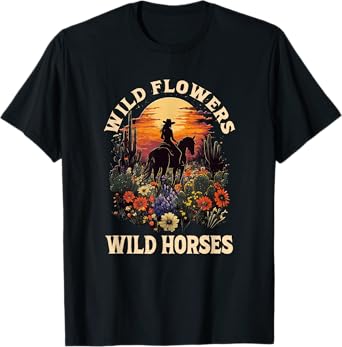 western sunset cowgirl riding horse wild flowers wild horses T-Shirt